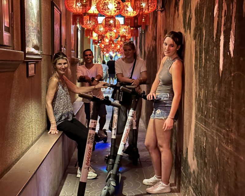 Bangkok: Electric Scooter Tour by Night - Wat Ratchanatdaram to Chao Phraya Sky Park: temples then river views