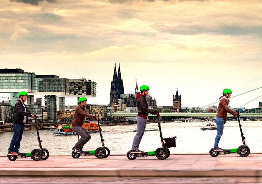 Cologne: Guided E-Scooter Tour - Hohenzollern Bridge to Old Town: Built-In Viewpoints for Real Photos