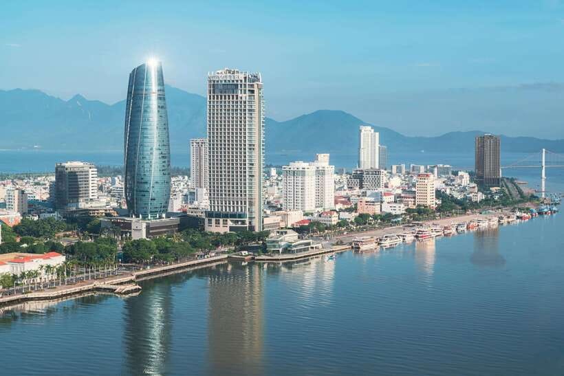 Da Nang City Eco Adventure Tour with Scooter - The private guide factor: green Ao Dai and careful driving