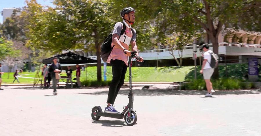 e-Scooter Step Kickstart Guided Tour: Sightseeing Maspalomas - Meloneras black-sand beach and a local bar stop