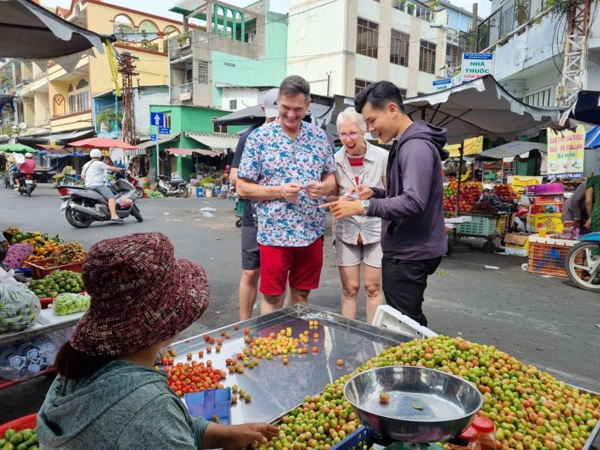 HCM City: Sightseeing Tour with Coffee and Fruit by Scooter - Passing markets and alleys: the in-between moments you’ll remember