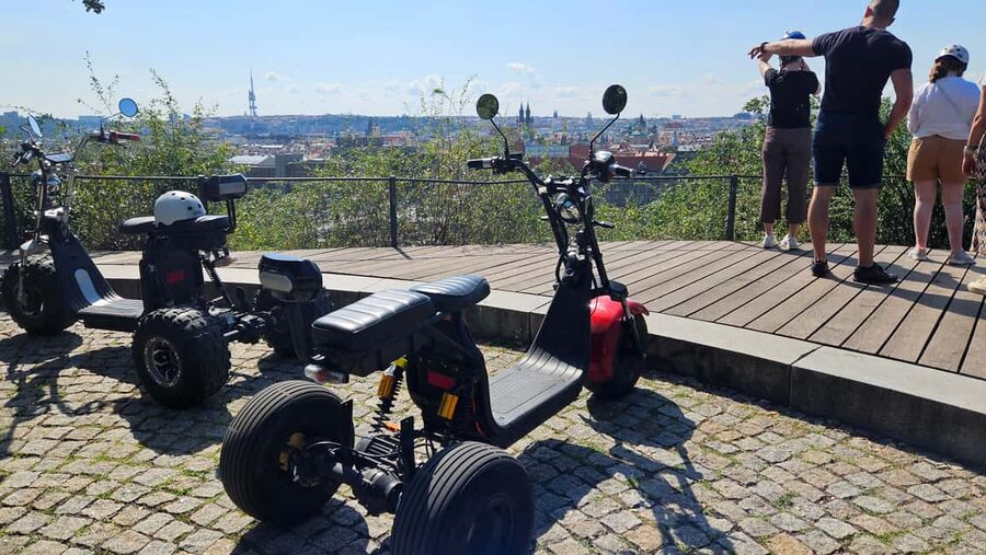 Heart of Prague tour on Tricycle electric scooter - Franz Kafka Museum area: the David Černý statues moment