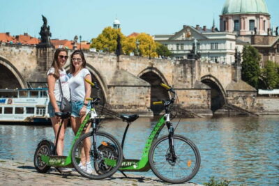Prague: 3-Hour E-Scooter Tour in German - Meeting point and your first steps: training, helmets, and a quick briefing