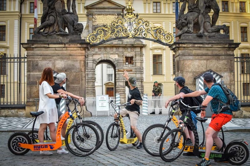 Prague: E-Scooter Grand City & Panoramas Small-Group Tour - Finding Your Start at Charles Bridge Economic Hostel