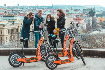 Prague: Fat Tire or Regular Scooter Tour with A Local Guide - Picking your ride: Hugo Bike vs SCROOSER fat tires