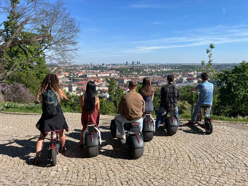 Prague Highlights: Segway & E-Scooter Tour with Taxi Pick-Up - Charles Bridge, National Theatre, and the city center rhythm