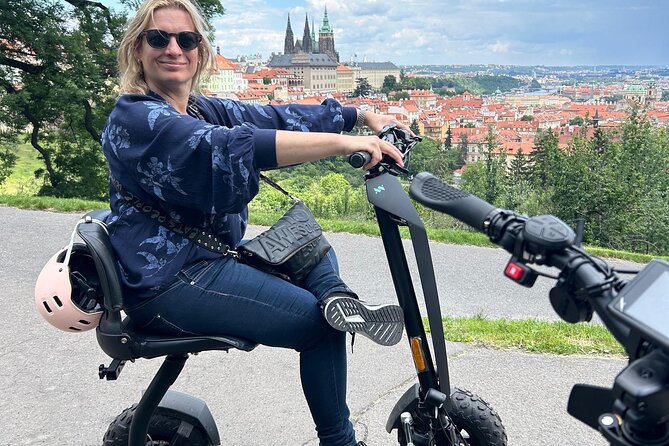 Scooter tours to Prague Castle and views. - Petřín hill and the optional tower time (funicular involved)