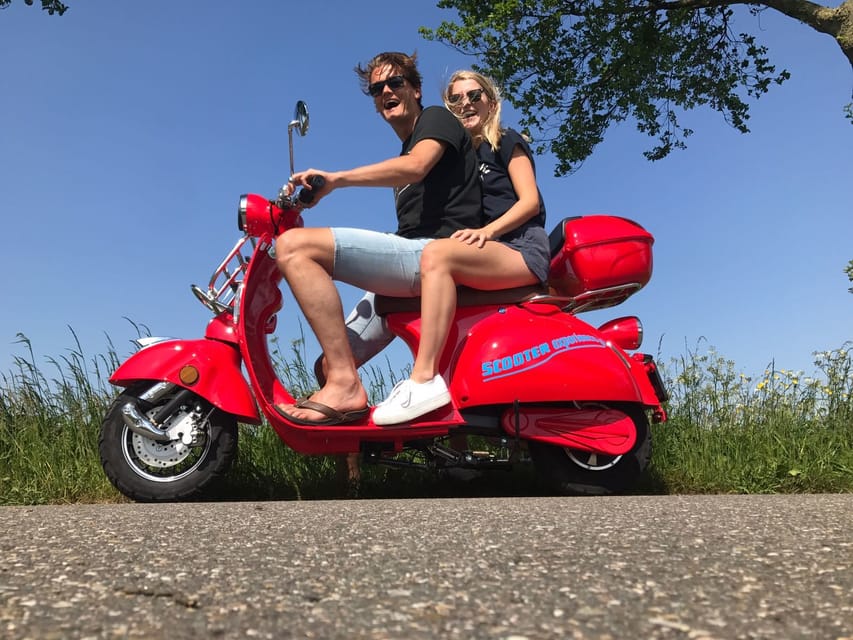 Zaanse Schans: Windmills, Clogs & Cheese by Electric Scooter - Cheese and clogs: the fun part that makes windmills feel real